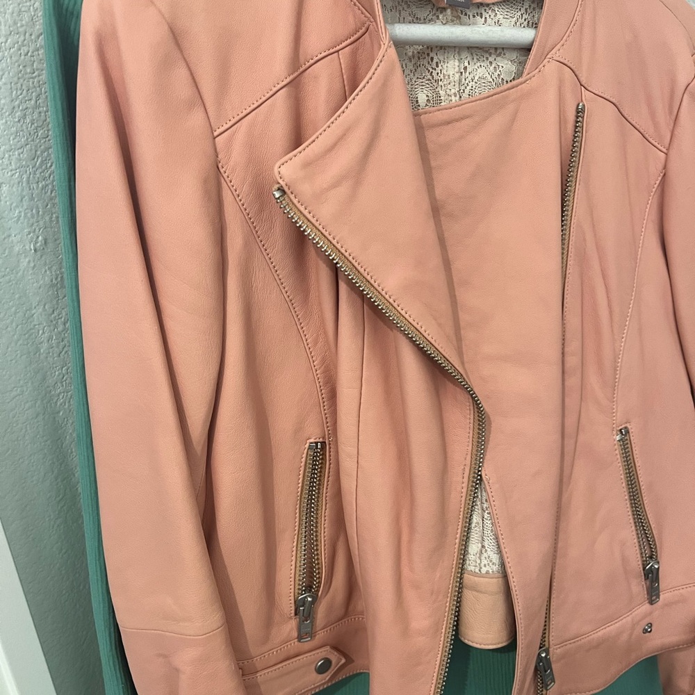 Fun lightweight leather jacket. Worn once but sleeves are too long for me!